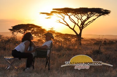 Tanzania Horizon Safaris Safari Gear List Couple at Sunset