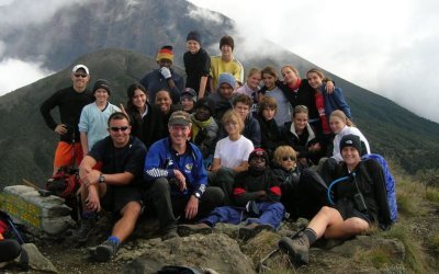 What are the advantages of a private versus a group climb